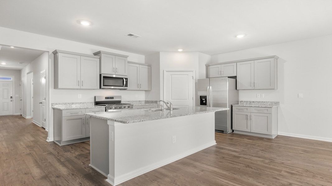 Representative furnished interior of a home built from the Cali by D.R. Horton in Highland Hills, Graniteville (Image 5).