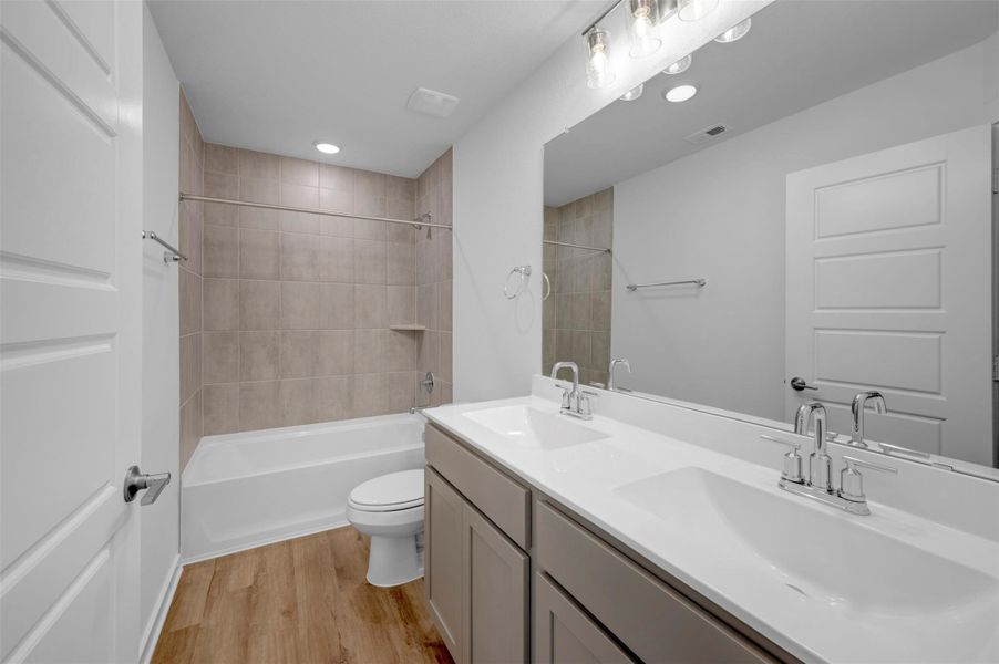 Furnished interior view inside a new home in Sorella, Tomball (Image 5).