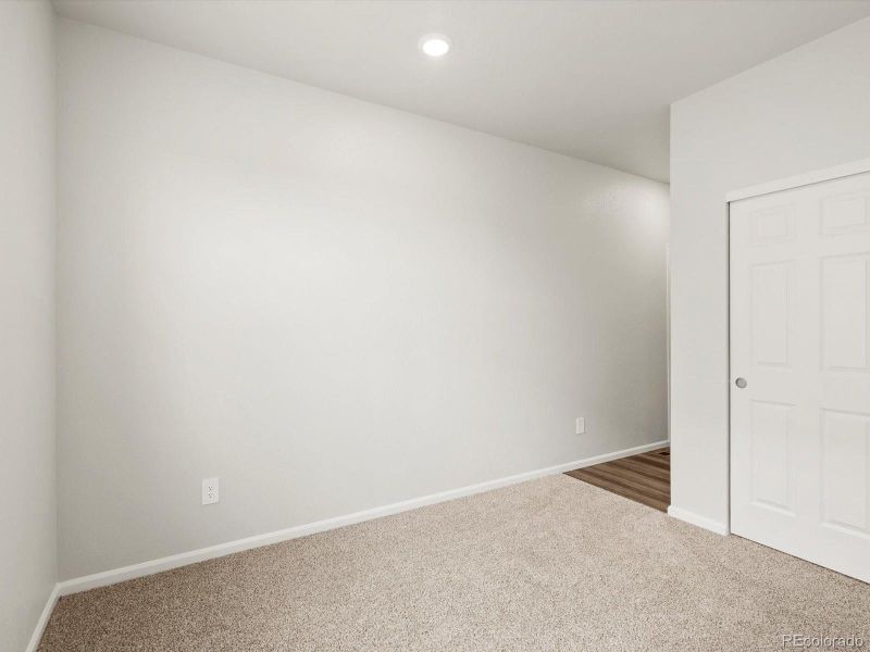 Spacious, unfurnished interior of a new home in Poudre Heights: The Lakes Collection, Windsor (Image 13).