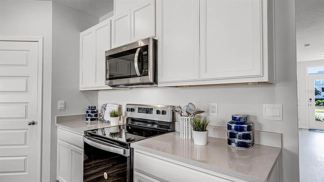 Furnished interior view inside a new home in Lake Deer Estates, Poinciana (Image 4). Furnished interior view inside a new home in Lake Deer Estates, Poinciana (Image 4).