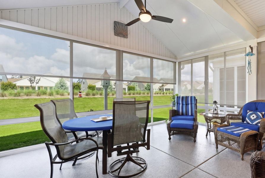 Exterior details and patio area of a home in K. Hovnanian's® Four Seasons at Lakes of Cane Bay, Summerville (Image 21).