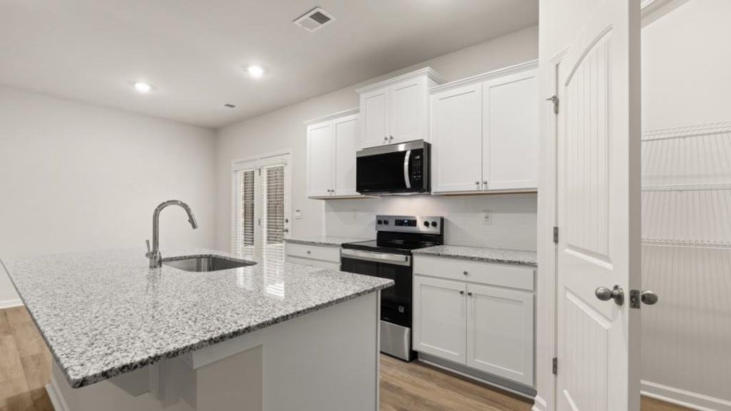 Furnished interior view inside a new home in Carlton, Douglasville (Image 5).