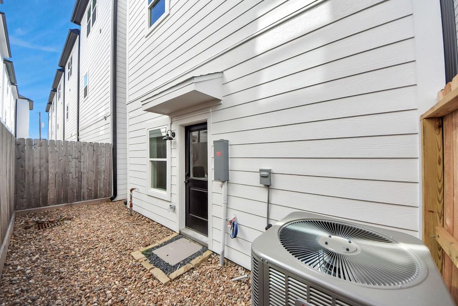 Exterior details and patio area of a home in Skyline Homes at Cavalcade, Houston (Image 27). Exterior details and patio area of a home in Skyline Homes at Cavalcade, Houston (Image 27).