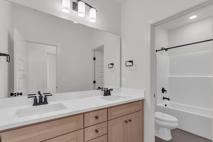 Representative furnished interior of a home built from the The Hampton by RobuckHomes in Stonehenge, Raleigh (Image 70).