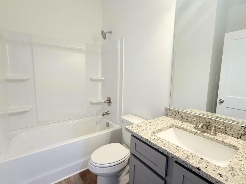 Furnished interior view inside a new home in Westlyn, Winder (Image 9).