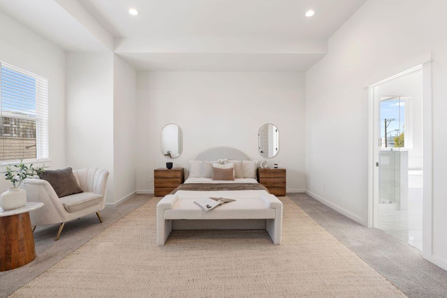 The second floor is home to the spacious primary suite.