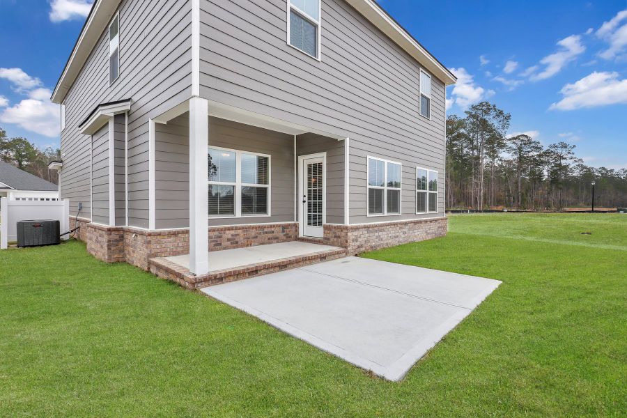 Representative exterior photo of a completed home built from the Seabrook by Ernest Homes in Wexford, Richmond Hill, GA (Image 29).