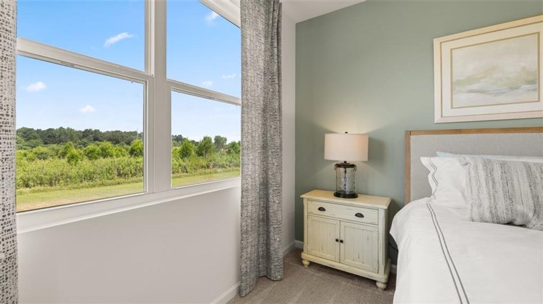 Furnished interior view inside a new home in The Preserve at Agricultural Village, Perry (Image 29).