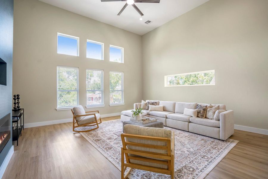 Spacious living area with tons of natural light Spacious living area with tons of natural light