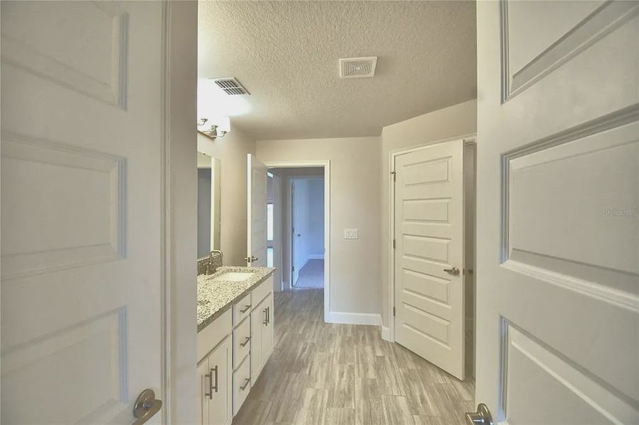 Furnished interior view inside a new home in Lake Juliana Estates, Auburndale (Image 10).