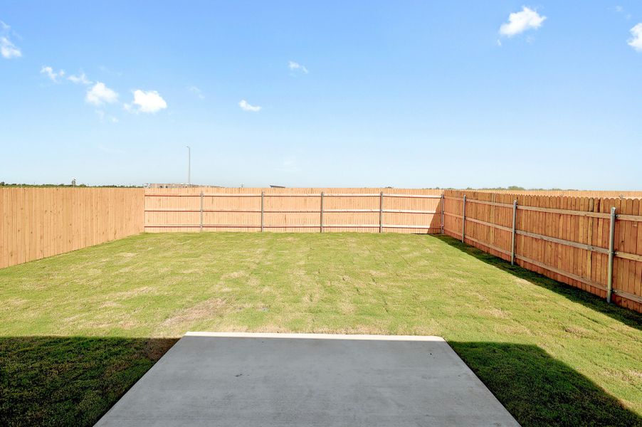 Exterior details and patio area of a home in Trinity Ranch, Elgin (Image 3).