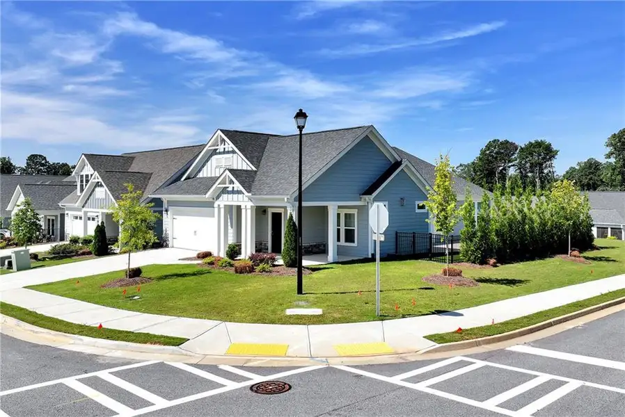 Front exterior of a new home in , Dacula, GA, highlighting curb appeal (Image 2). Front exterior of a new home in , Dacula, GA, highlighting curb appeal (Image 2).