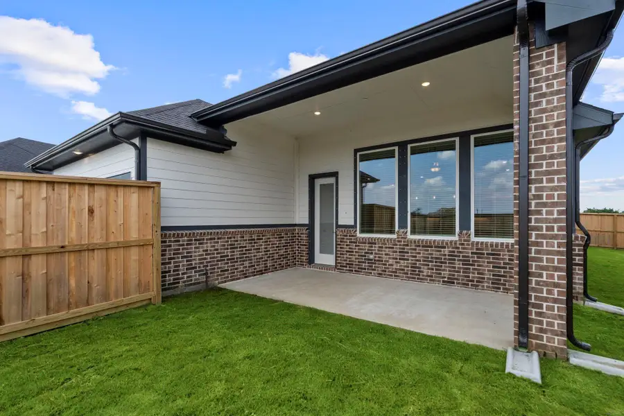 Exterior details and patio area of a home in Riceland, Mont Belvieu (Image 3).