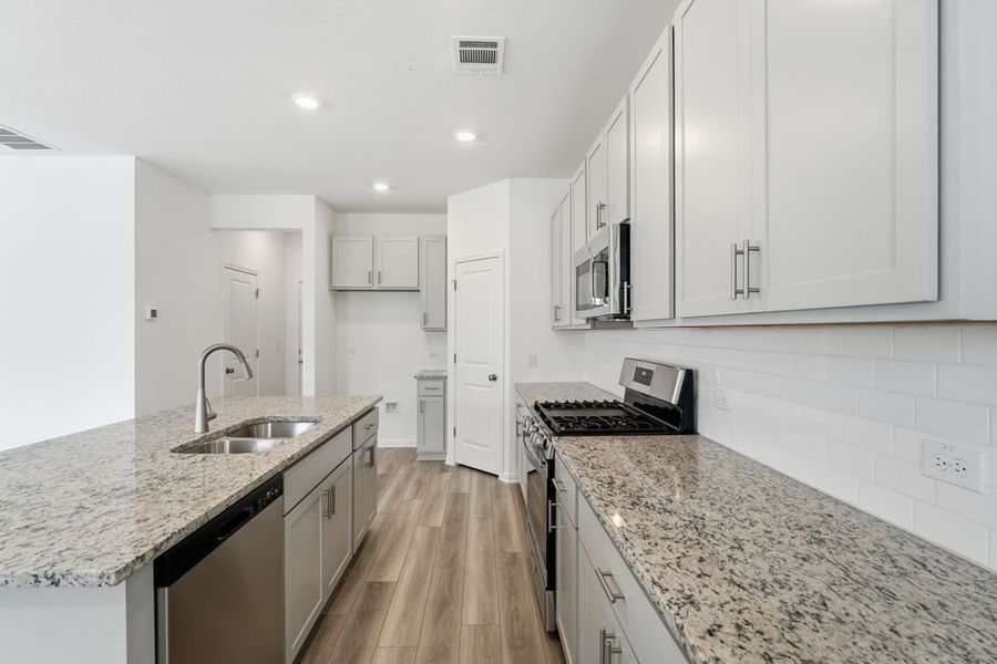 Furnished interior view inside a new home in Longview, Del Valle (Image 5).