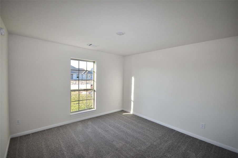 Spacious, unfurnished interior of a new home in Pedregal, League City (Image 22).