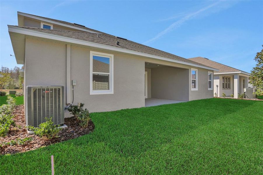 Exterior details and patio area of a home in Angeline, Land O' Lakes (Image 3).
