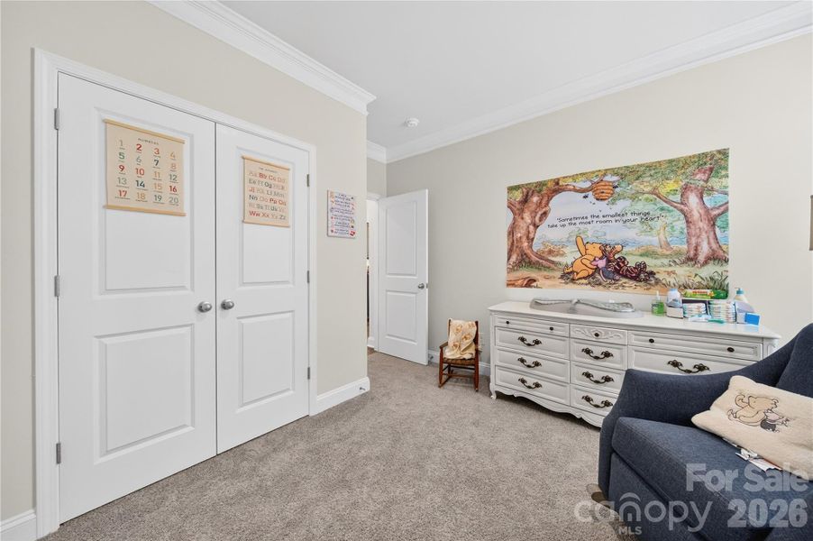 Main level bedroom with double closet for max storage.