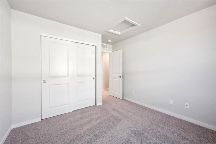 A room with white doors.