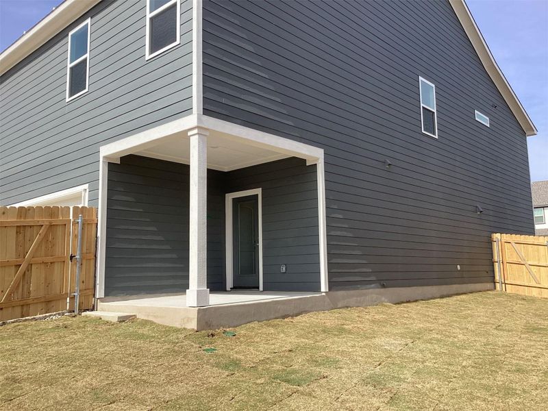 Exterior details and patio area of a home in Lariat, Liberty Hill (Image 4).