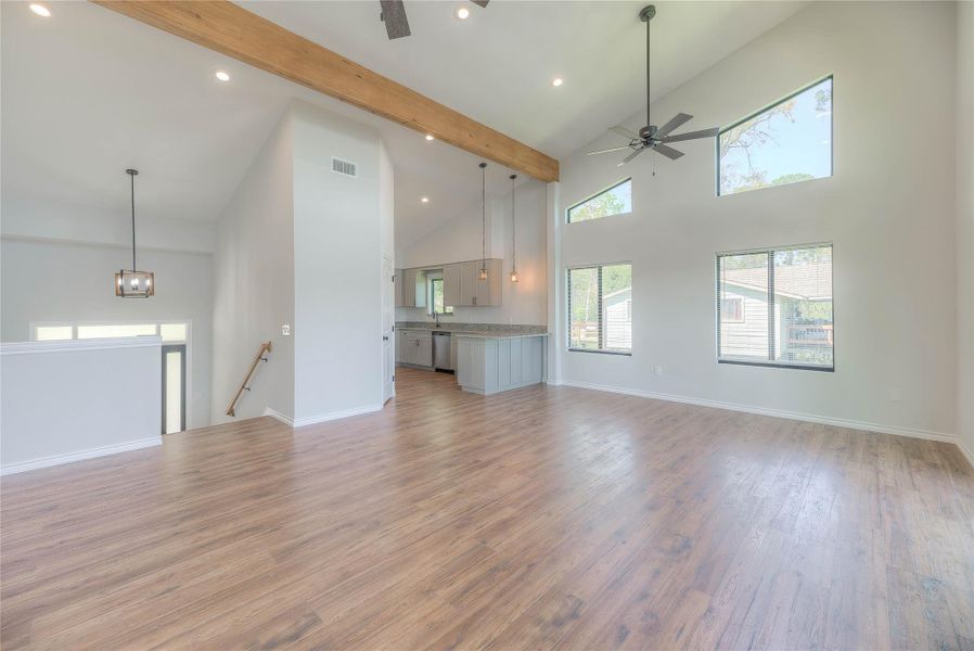 ANOTHER VIEW OF LIVING AREA AND KITCHEN