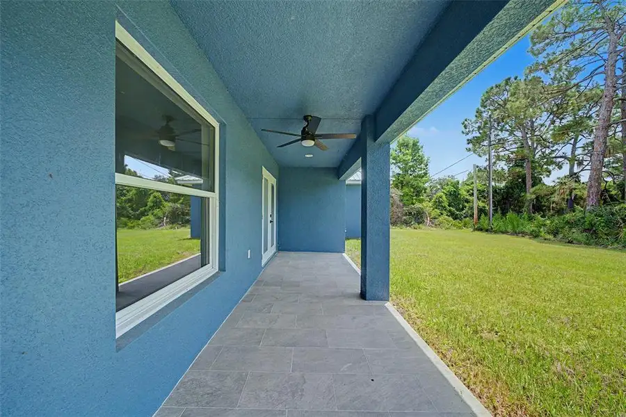 Exterior details and patio area of a home in , Sebring (Image 2). Exterior details and patio area of a home in , Sebring (Image 2).