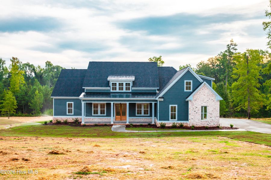 Front exterior of a new home in Marshall Mills, Grovetown, GA, highlighting curb appeal (Image 1). Front exterior of a new home in Marshall Mills, Grovetown, GA, highlighting curb appeal (Image 1).