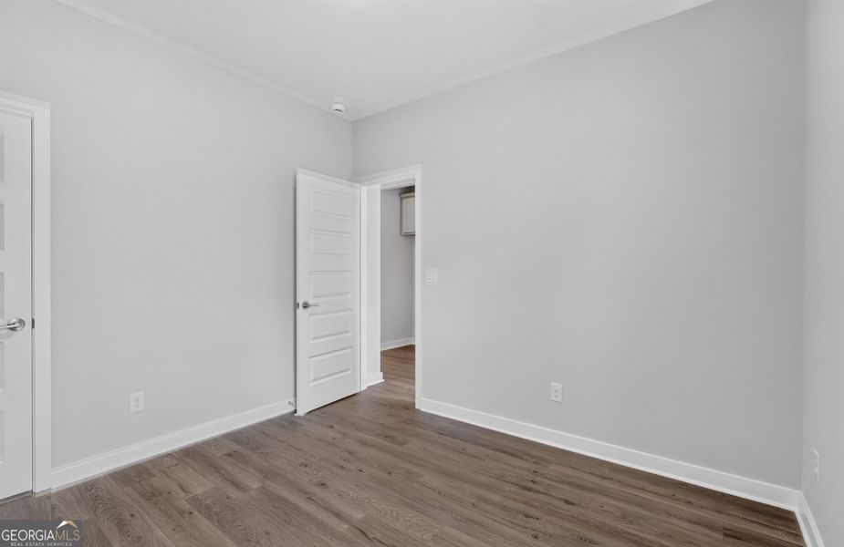 Spacious, unfurnished interior of a new home in The Cottages at East Lanier, Fayetteville (Image 14).