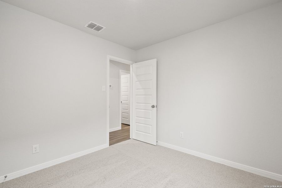 Spacious, unfurnished interior of a new home in Abbott Place, St. Hedwig (Image 13).