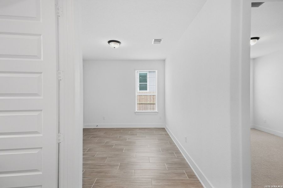 Spacious, unfurnished interior of a new home in The Reserve at Potranco Oaks, Castroville (Image 33). Spacious, unfurnished interior of a new home in The Reserve at Potranco Oaks, Castroville (Image 33).