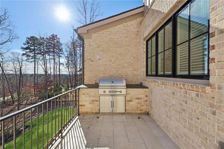 Exterior details and patio area of a home in , Suwanee (Image 38).
