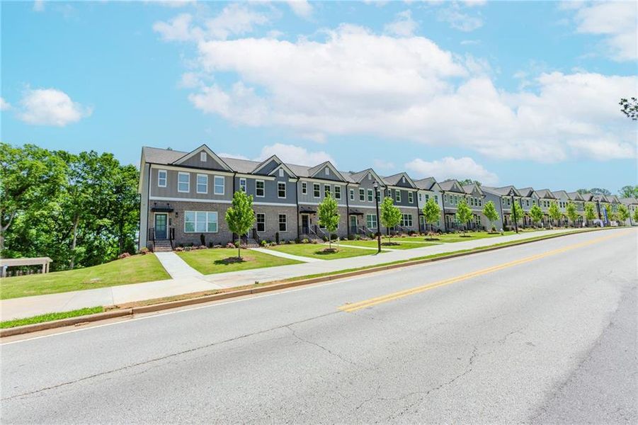 Exterior details and patio area of a home in Hillcrest Landing, Sugar Hill (Image 2). Exterior details and patio area of a home in Hillcrest Landing, Sugar Hill (Image 2).