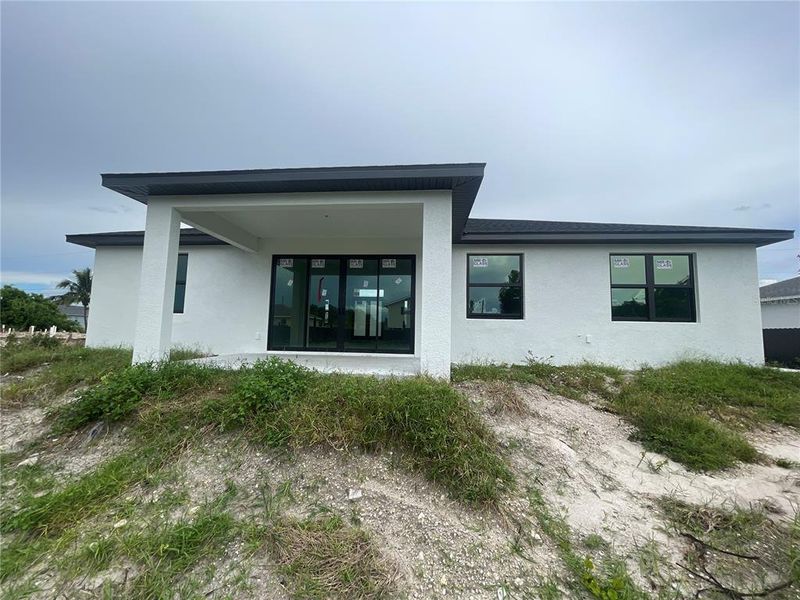 Exterior details and patio area of a home in , Lehigh Acres (Image 3).