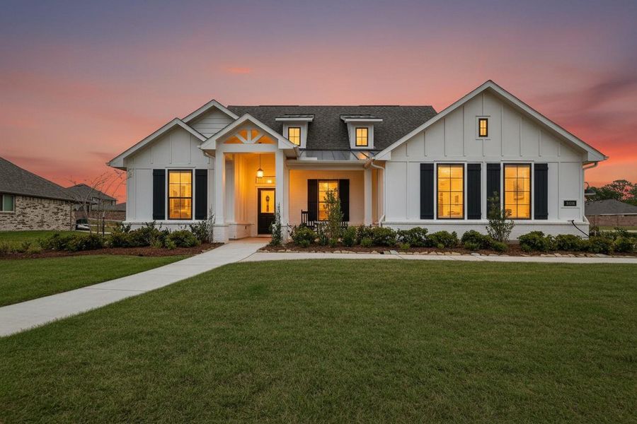 Front exterior of a new home in Lone Star Landing, Montgomery, TX, highlighting curb appeal (Image 22).