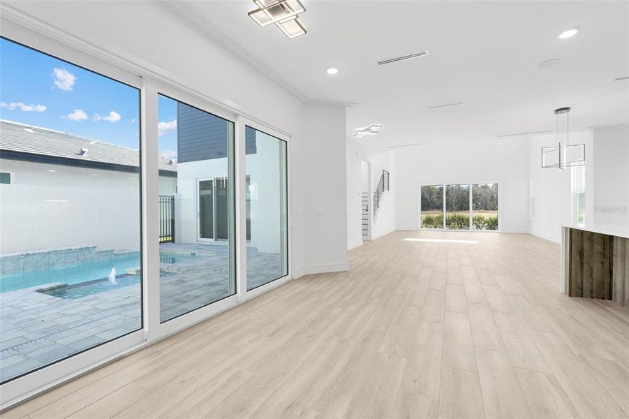 Spacious, unfurnished interior of a new home in Hampton Green at Providence, Davenport (Image 24).