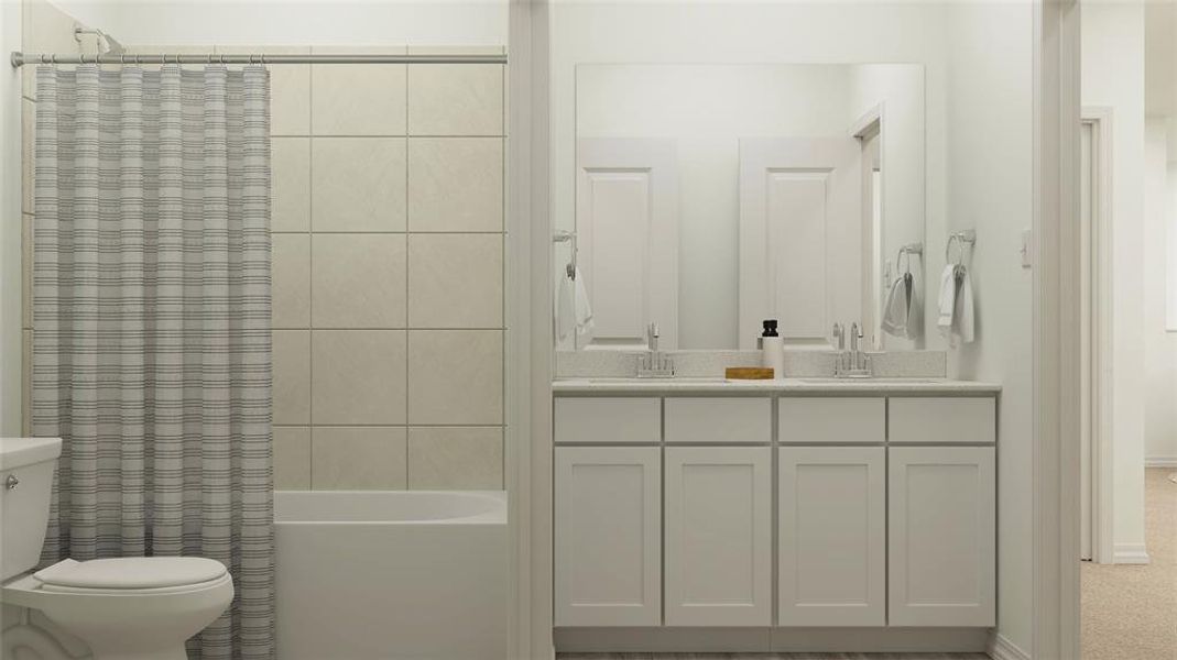 Full bathroom featuring vanity, shower / bathtub combination with curtain, and toilet