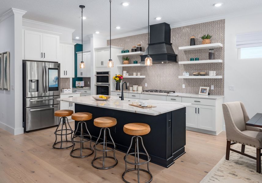 Representative furnished interior of a home built from the Eliot by Rockwell Homes in Northlake at Ovation, Winter Garden (Image 8). Representative furnished interior of a home built from the Eliot by Rockwell Homes in Northlake at Ovation, Winter Garden (Image 8).