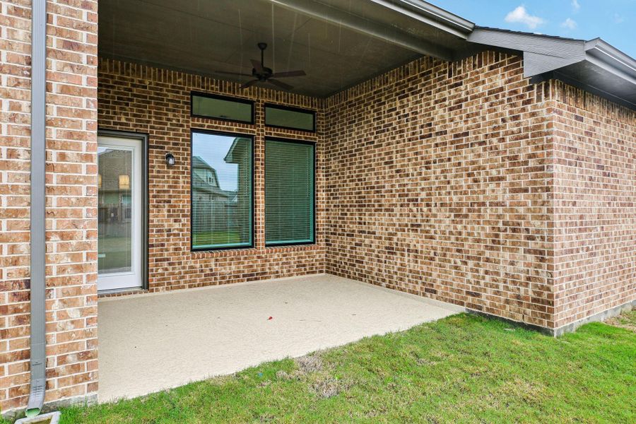 Exterior details and patio area of a home in The Trails, New Caney (Image 3).