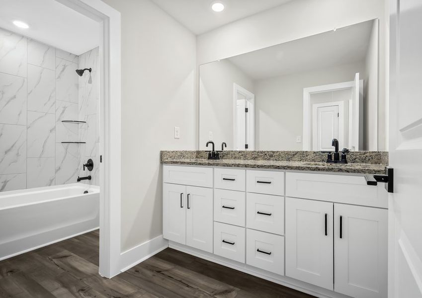 The secondary bathroom offers your guests all the space they need to get ready in the morning