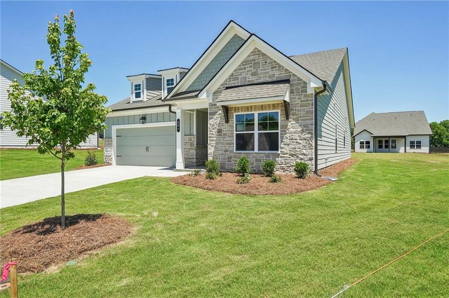 Front exterior of a new home in Garland Meadows, Cartersville, GA, highlighting curb appeal (Image 2). Front exterior of a new home in Garland Meadows, Cartersville, GA, highlighting curb appeal (Image 2).
