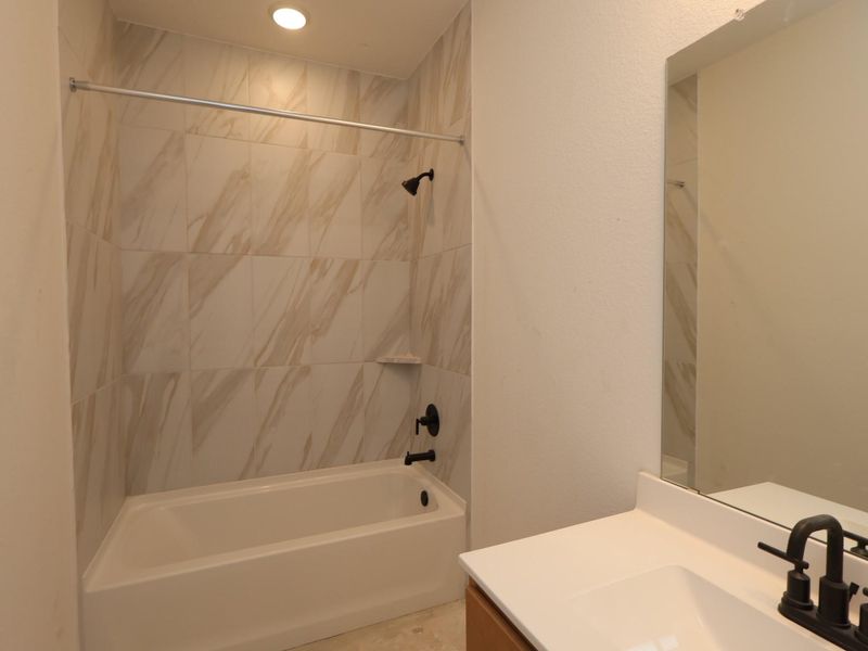 Furnished interior view inside a new home in Sorella, Tomball (Image 6).