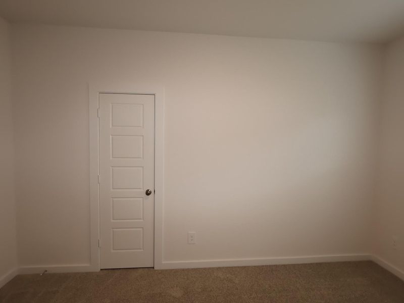 Spacious, unfurnished interior of a new home in Pinewood at Grand Texas, New Caney (Image 20).