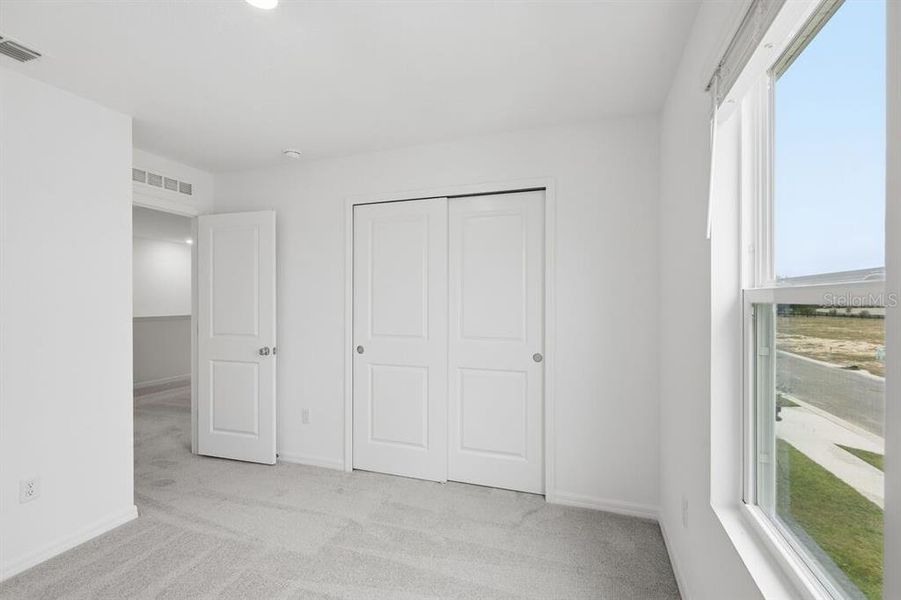 Spacious, unfurnished interior of a new home in Waterstone, Groveland (Image 42).
