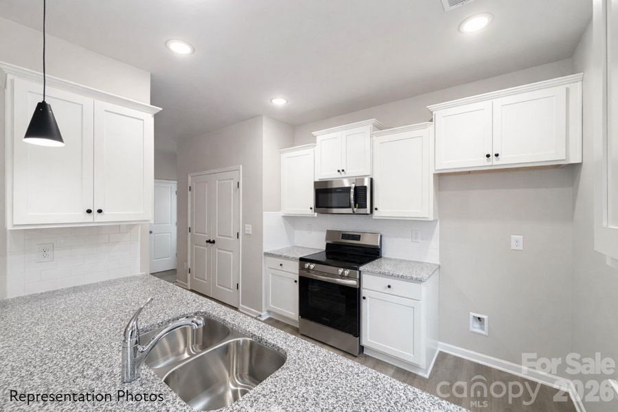 Furnished interior view inside a new home in , Charlotte (Image 4). Furnished interior view inside a new home in , Charlotte (Image 4).