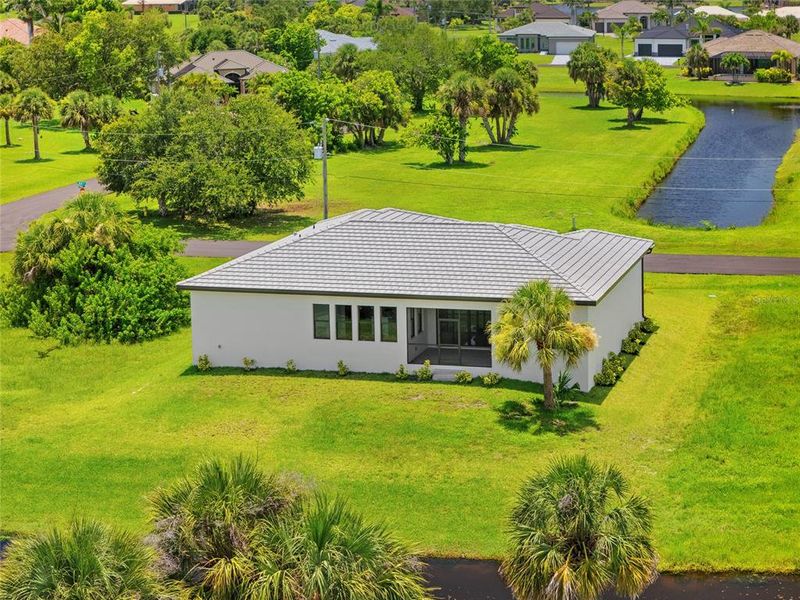 Front exterior of a new home in , Punta Gorda, FL, highlighting curb appeal (Image 2).