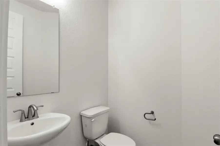 Bathroom with a sink and toilet