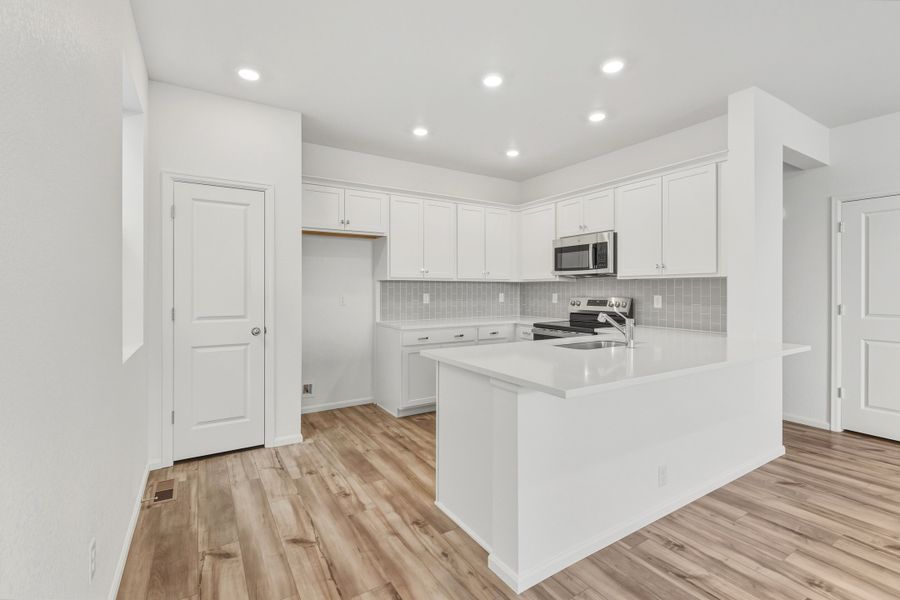 Furnished interior view inside a new home in Windler, Aurora (Image 3).
