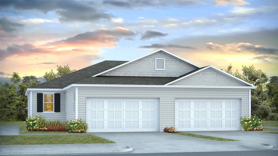 Front exterior of a new home in Indigo Preserve Townhomes, Leland, NC, highlighting curb appeal (Image 1).