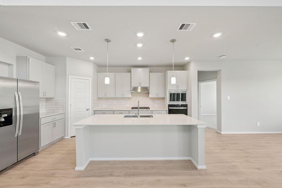 Furnished interior view inside a new home in Riviera Pines - Classic Series, Huffman (Image 14).
