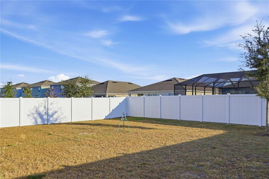 Exterior details and patio area of a home in Wind Meadows South, Bartow (Image 3).