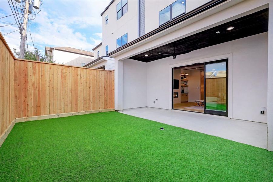 Effortless outdoor living with a fully turfed backyard, complete with a sophisticated drainage system. The shaded patio is entertainment-ready, featuring pre-wiring for sound and security. Enjoy the convenience of outdoor gas and water connections.